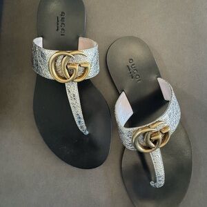 Gucci Women's Black and Gold Sandals
